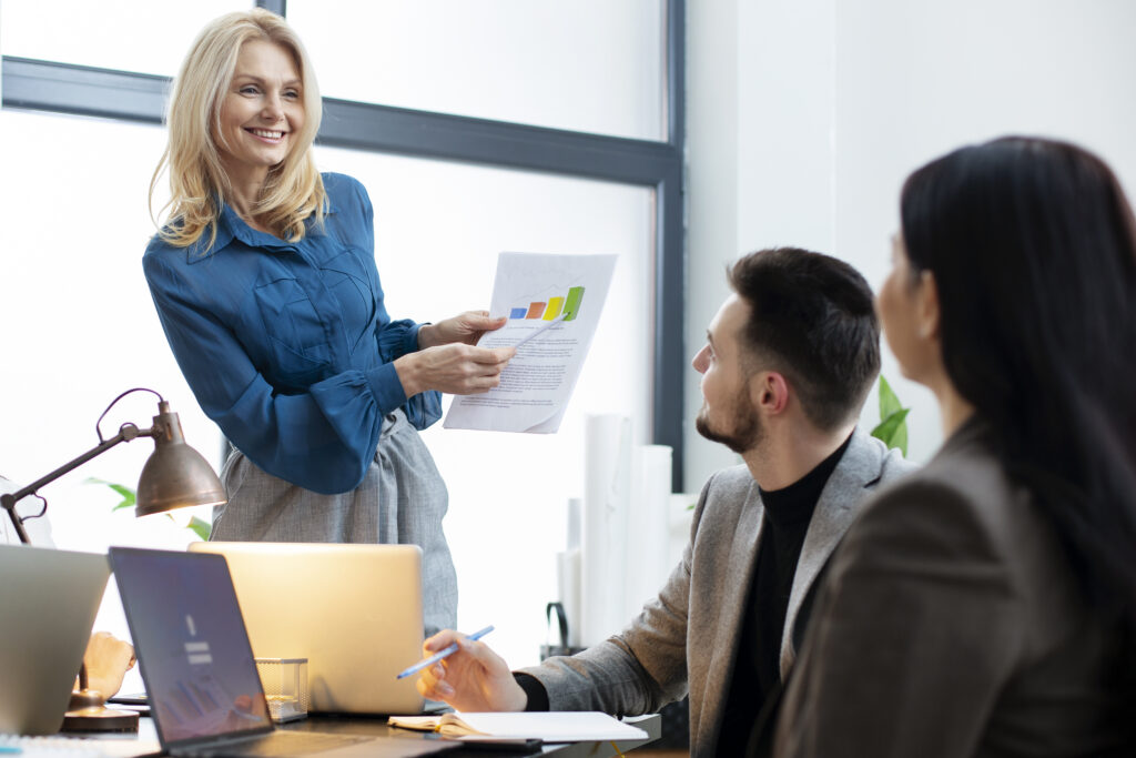 Medium shot people working together